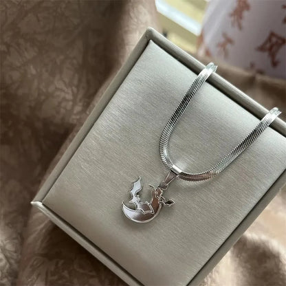 Stainless Steel OX Moon Necklace | Gold Plated Half Moon Blade Pendant
