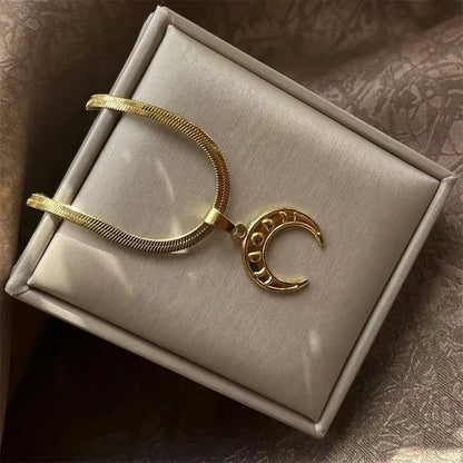 Stainless Steel OX Moon Necklace | Gold Plated Half Moon Blade Pendant